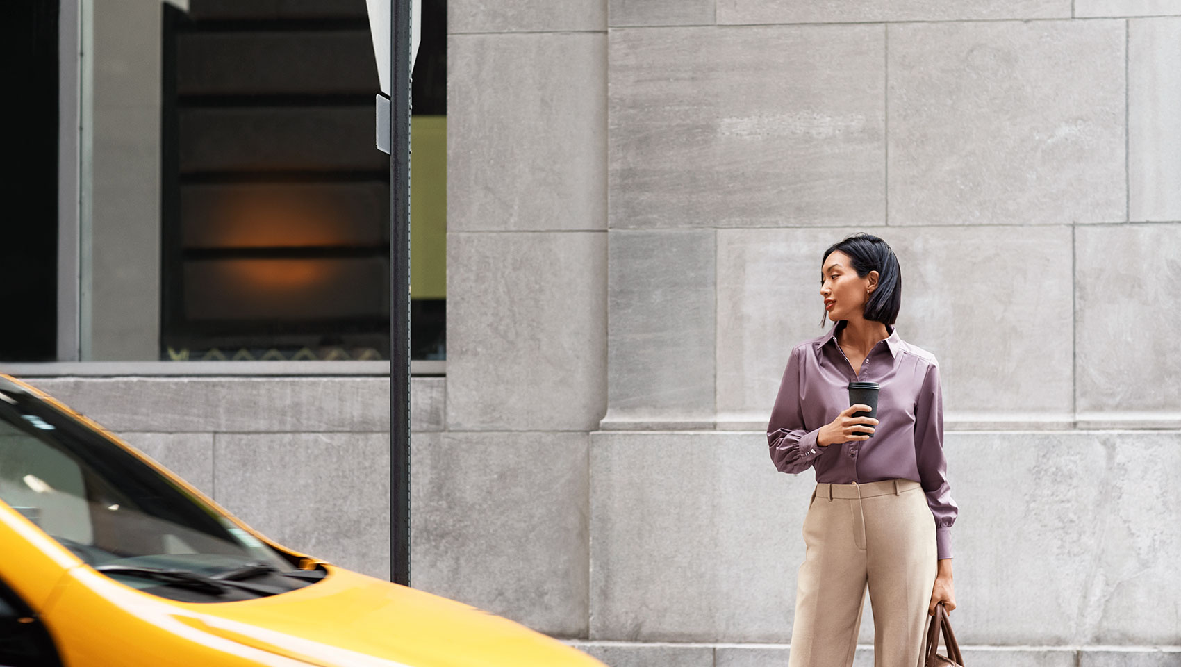 Woman in New York City with Cab